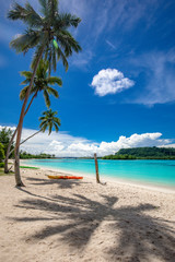Fototapeta na wymiar Port Orly sandy beach with palm trees, Espiritu Santo Island, Vanuatu.