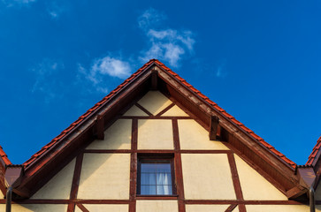 Attic apartment building with window