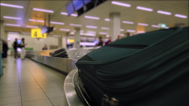 Baggage conveyor belt at Schiphol Airport for claiming luggage