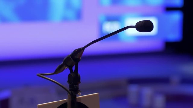 speaker microphone in big venue