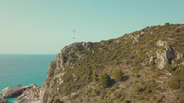 Para planning shots over a beautiful Lefkada beach in Greece.