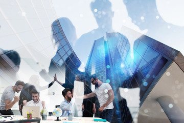 Handshaking business person in the office. concept of teamwork and business partnership. double...