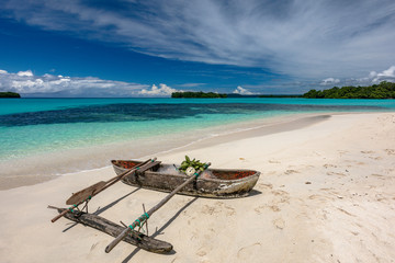 Port Orly sandy beach with palm trees, Espiritu Santo Island, Vanuatu.