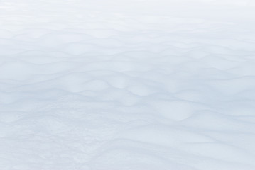 Winter background with snowdrifts