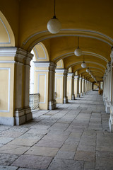 White columns along the gallery Gostiny Dvor, St. Petersburg, Russia