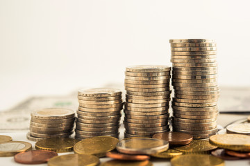 step of coins stacks on table, money, saving and investment concept