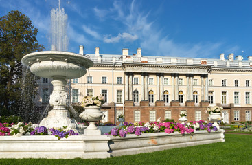 Beautiful garden with a marble fountain near the southern wing of the Great Catherine Palace in a...