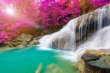 Amazing in nature, beautiful waterfall at colorful autumn forest in fall season