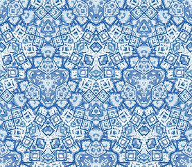 Blue kaleidoscope seamless pattern. Geometric abstraction on white background. Useful as design element for texture and artistic compositions.