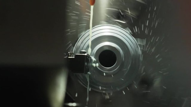 Metalworking CNC milling machine. Cutting metal modern processing technology.