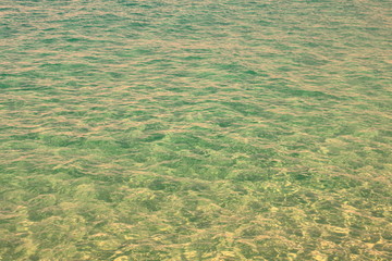 Beautiful natural background with perfectly clear sea water