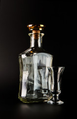 Beautiful Clear glass bottle isolated on black background