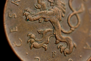 Coin ten Czech koruna macro isolated on black background. Detail of metallic money close up. European country money Czech Republic