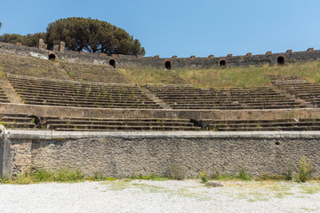 the oldest surviving Roman Amphitheatre in ancient city of Pompeii, Italy. Pompeii was destroyed...