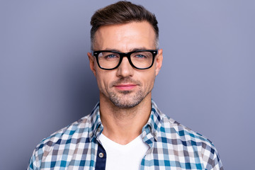 Obraz premium Close up photo handsome he him his guy intelligent reliable manager financier person peacefully cute not smile neat bristle beard wear specs casual plaid checkered shirt isolated grey background