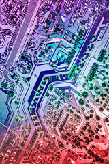 Photograph of multicolored computer microcircuit motherboard detail