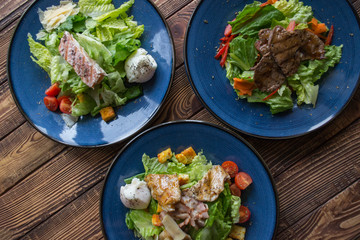The tasty salads on a table.