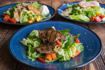 The tasty salads on a table.