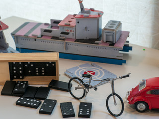 The toys bicycle and domino