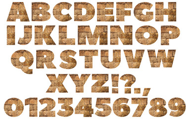 Alphabet from Stone block wall texture isolated on white background