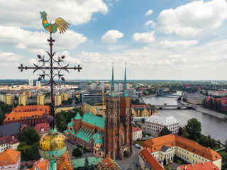 The weathercock of Collegiate Church of the Holy Cross and St. Bartholomew,  aerial view of...