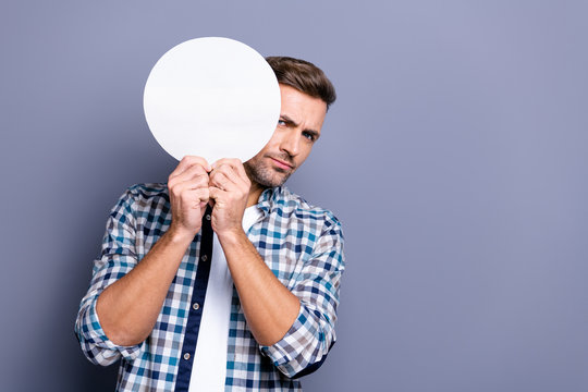 Close Up Photo Handsome He Him His Guy Arms Hands Holding Round Circle Shape Figure Paper List Hiding Half Face Not Sure Show Person Or No Wear Casual Plaid Checkered Shirt Isolated Grey Background