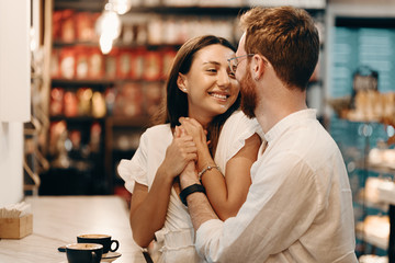 Loving couple in a coffee shop
