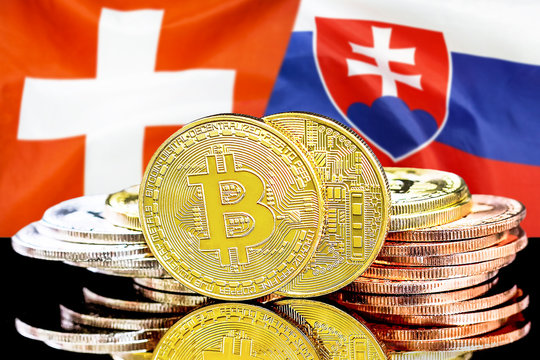 Concept for investors in cryptocurrency and Blockchain technology in the Switzerland and Slovakia. Bitcoins on the background of the flag Switzerland and Slovakia.