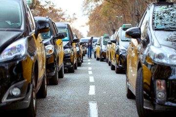Taxi drivers strike in Barcelona. The main street of the city, blocked by taxi cars.