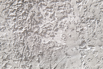 Grey cement wall background, close up grunge with natural texture with bright ligt and shadows.