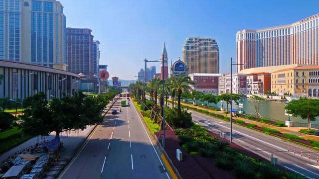 Timelapse Car movement along Estr.do Istmo street In Central Macau, Venetian Macao Hotel.