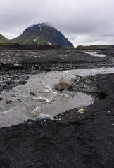 River in iceland and path to mountain