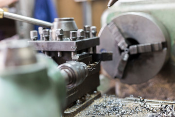 Lathe for metal material processing