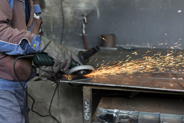 Grinding of materials in metallurgy workshop