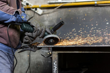 Grinding of materials in metallurgy workshop