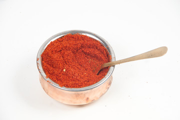 indian red chili powder isolated on white background