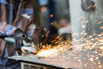 Grinding of materials in metallurgy workshop