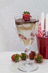 dessert with fresh strawberry, cream cheese and strawberry jam on glass
