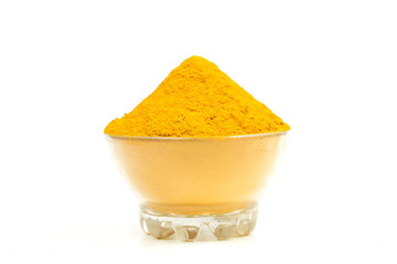 Turmeric powder isolated on a white background
