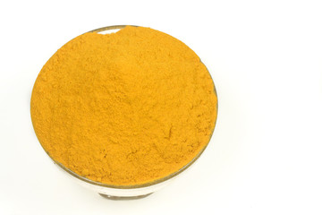 Turmeric powder isolated on a white background