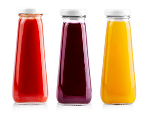 The Glass bottles of  juice isolated on white