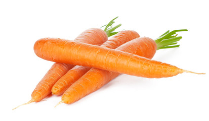 Isolated carrots. Heap of fresh carrots with stems isolated on white background