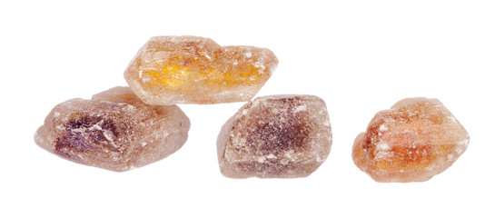 Pile of brown granulated sugar isolated on white background