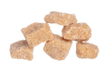 Brown cane sugar cubes isolated on white background