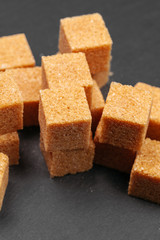 Rock sugar on dark background close up