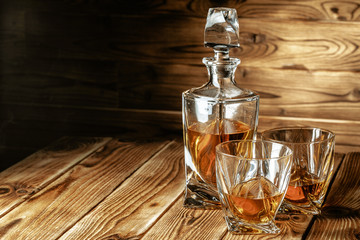 glasses with cognac, whiskey stand on the bar