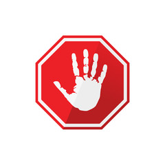 red stop sign with palm of hand