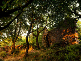 Amazing Summer Solstice light on the old church ruins. Monti san Lorenzo, above Lerici in Liguria. Annual natural event.