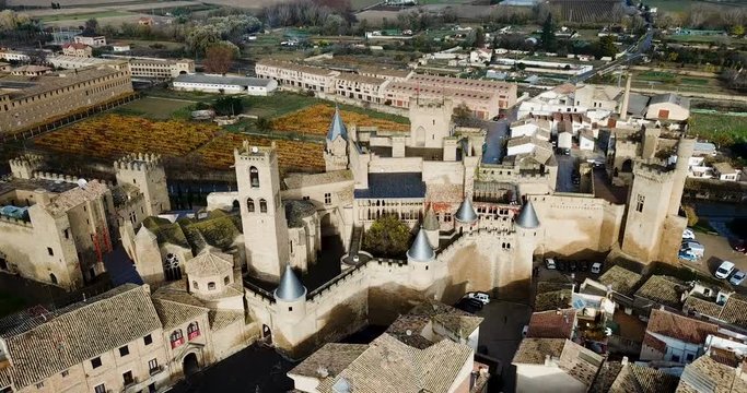 Aerial view of impressive medieval Royal Palace of Olite in autumn day, Navarre, Spain