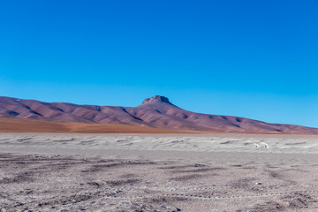 Background with barren desert scenery in the Bolivian Andes, in the Nature reserve Edoardo Avaroa